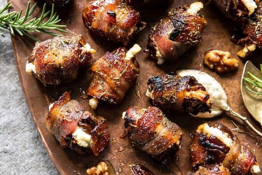 Bacon Wrapped Dates -- Stuffed Goat Cheese topped with a Black Mission Fig Reduction