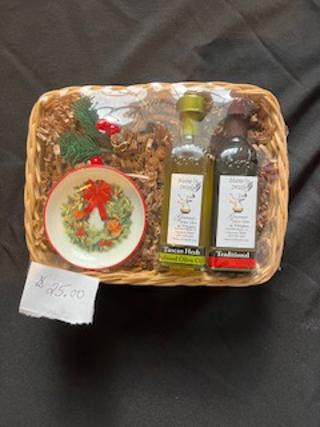 2 oz pairing with small trinket dish displayed in small wicker basket
